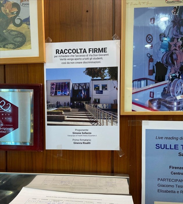 la locandina per la raccolta firme esposta alla pasticceria Buscioni, uno dei luoghi dov'è possibile formare